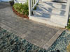 Existing flagstone walkway of stepping stones removed and replaced with interlocking concrete pavers